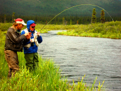 YUKON INCONNU LODGE DAVID FIGHTING LAKE TROUT