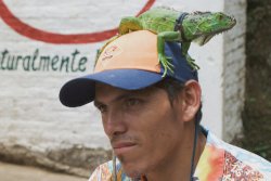 El Salvador Nahuizalco man with iguana on head